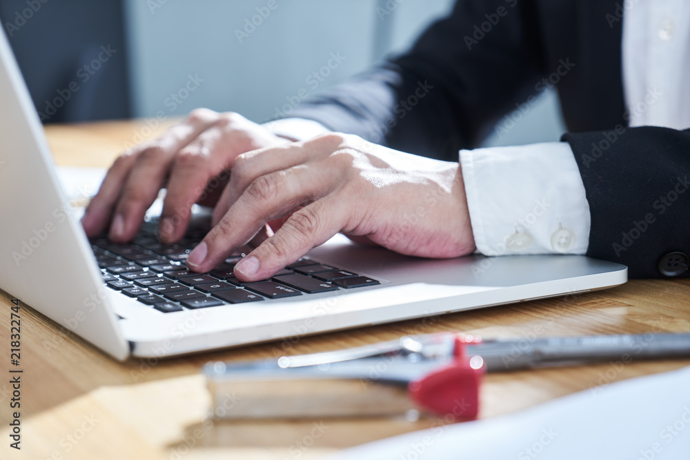 Closeup businessman using laptop to work . Closeup businessman using laptop to work .
