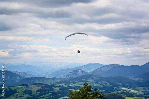 Landscape with a paraglider