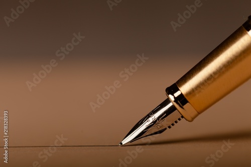 Parker Fountain Pen Draws a Straight Line on the Brown
