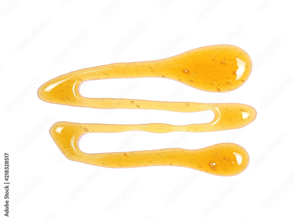 Honey isolated on white background, top view Honey isolated on white background, top view