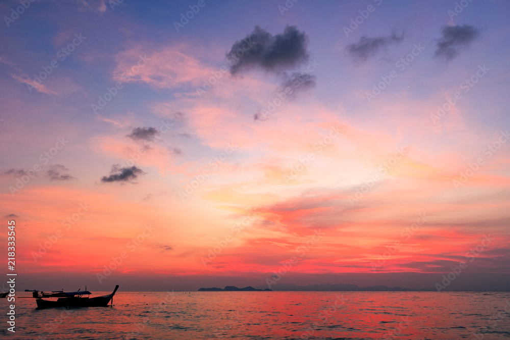 Sightseeing travel concept:Traditional thai boats at sunset beach Sightseeing travel concept:Traditional thai boats at sunset beach