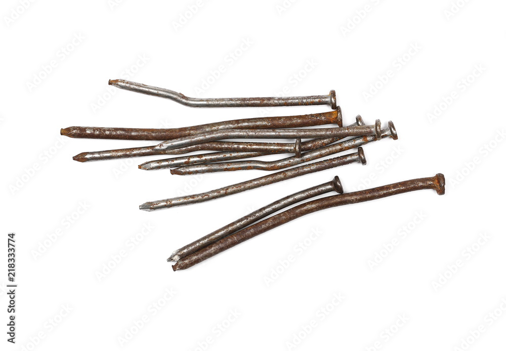 Pile of old, rusty metal nails isolated on white background, top view Pile of old, rusty metal nails isolated on white background, top view