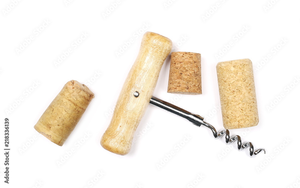 Corkscrew and wine corks isolated on white background, top view Corkscrew and wine corks isolated on white background, top view