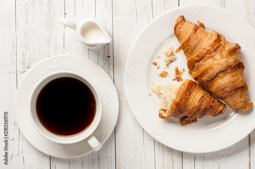 Fresh croissants with coffee