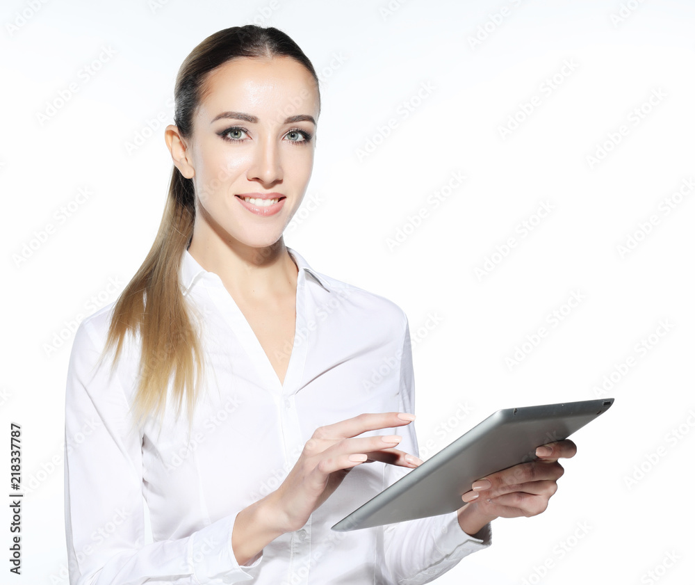Business woman holding tablet computer isolated on white background Business woman holding tablet computer isolated on white background