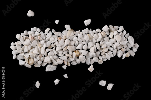 White rocks, gravel isolated on black background with clipping path, top view