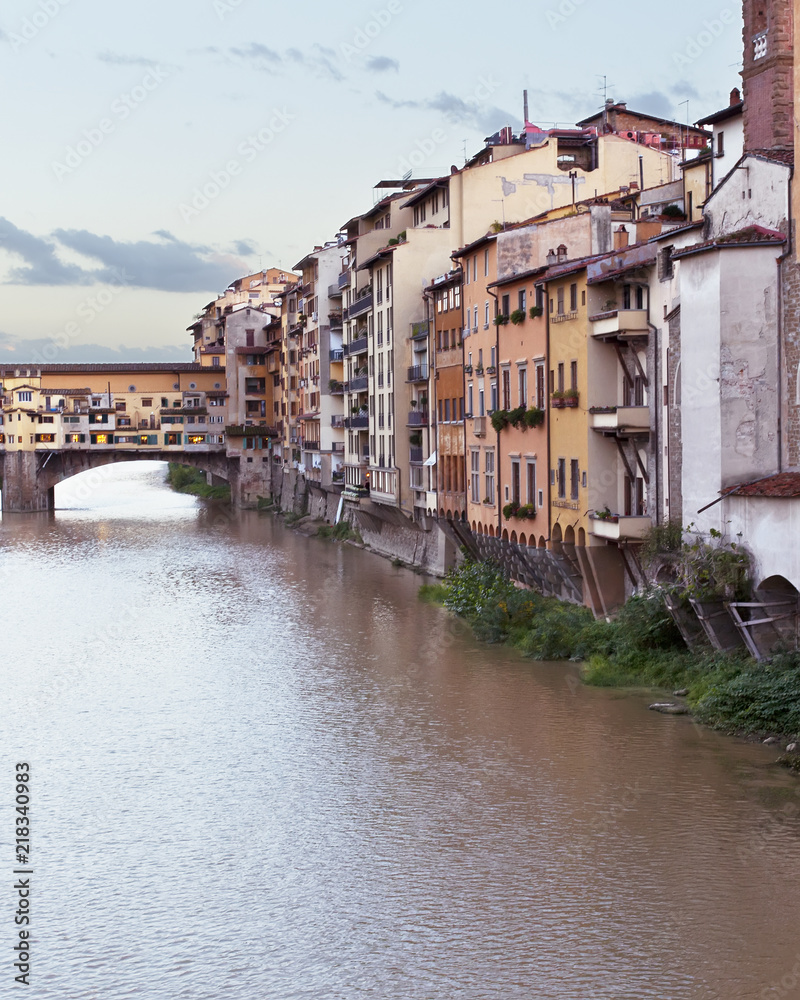 Ponte Vecchio bridge with Arno river in Florence, Italy