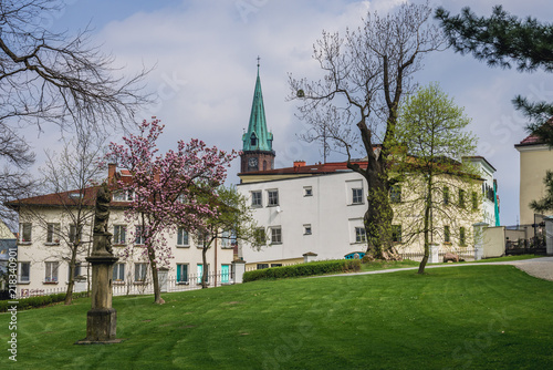 Castle park in Frydek-Mistek town, Moravian-Silesian Region of Czech Republic, view with tower of John the Baptist Church