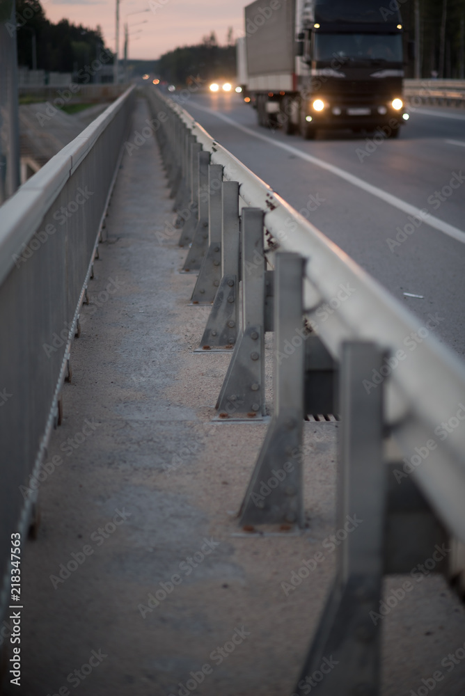 Safety barrier on freeway bridge