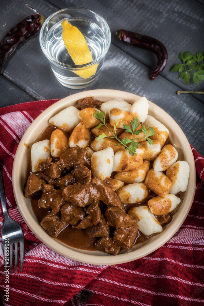 Beef stew with potatoes dumplings.