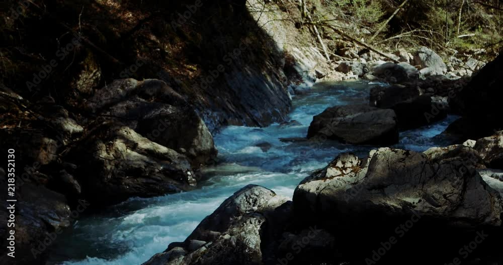 River in the Alps mountains in early spring River in the Alps mountains in early spring