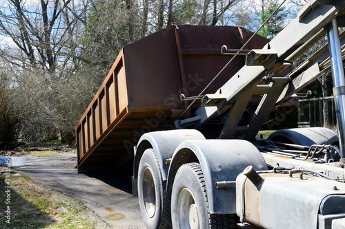 Truck roll-off dumpster photo