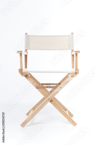Fotografie director chair made of wood and fabric well Comfortable sitting on white backdro