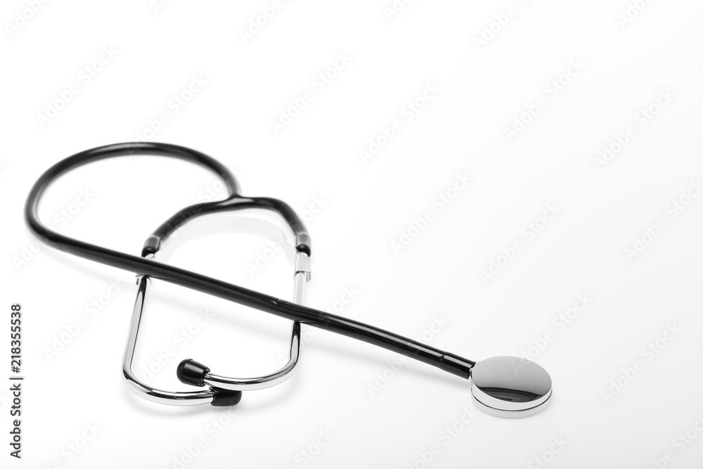 Studio shot of black stethoscope on white background, concept for healthcare object. Studio shot of black stethoscope on white background, concept for healthcare object.