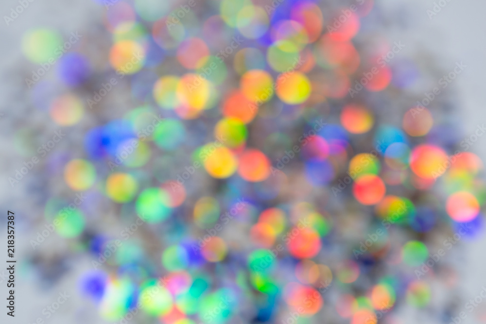 Abstract background with bokeh effect. Blurred defocused lights in gold colors