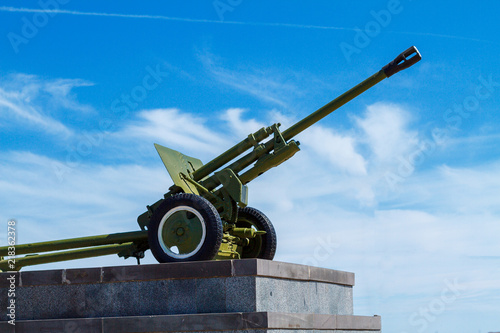 artillery cannon of the great Patriotic war stands against the blue sky