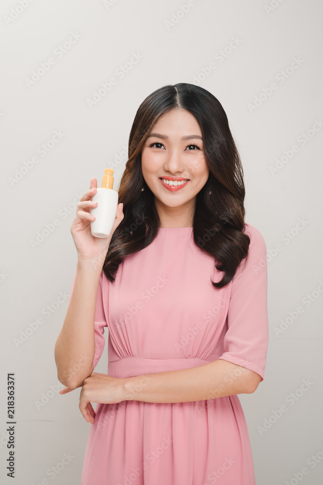 health and beauty concept - happy woman with skincare package health and beauty concept - happy woman with skincare package