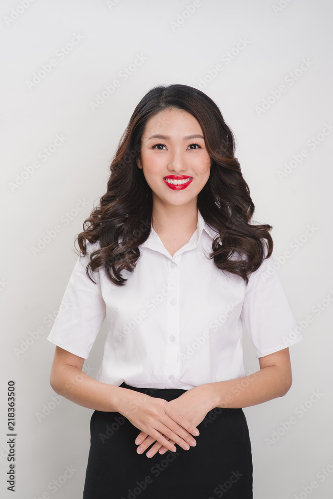 pretty business woman smile standing isolated on white background, model is a asian female pretty business woman smile standing isolated on white background, model is a asian female