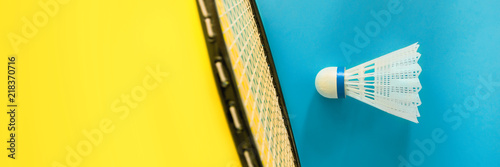 Canvas Print Volant and racket for playing badminton on yellow background