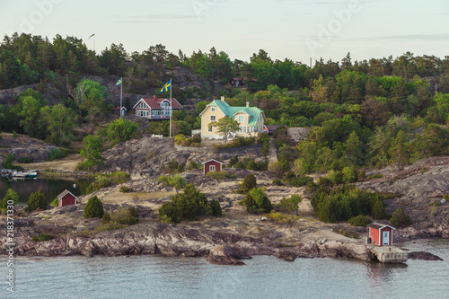 10 July 2018 Stockholm, Sweden: Summer house in one of the thousands of little islands of the Archipelago of Stockholm, Sweden photo