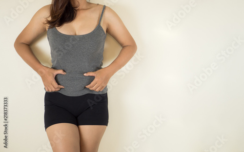 fat overweight women showing her fat tummy.