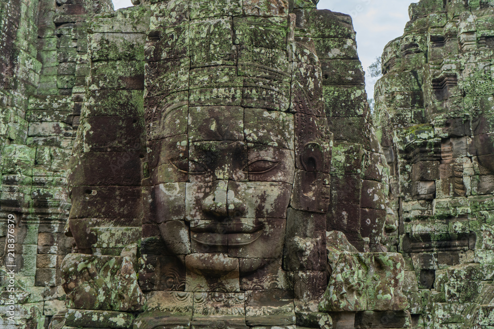 Faces of Bayon temple in Phnom Penh - Siem Reap, Cambodia ,before dawn in the morning, reflecting the water.It is the largest castle and religious place in the world.UNESCO is a World Heritage Site.