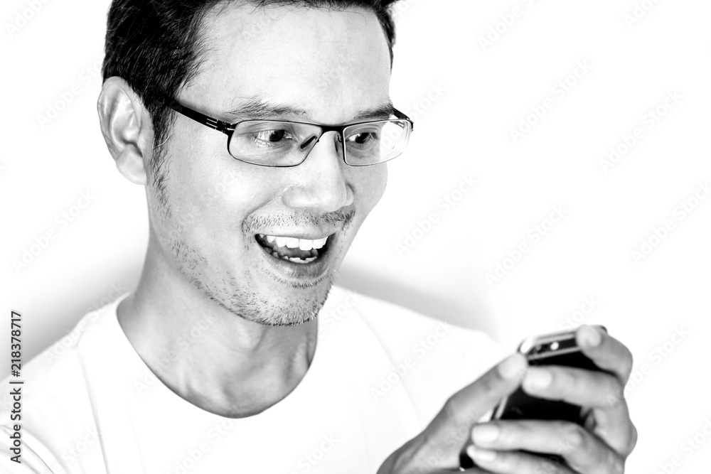 Man using smartphone and happy Man using smartphone and happy