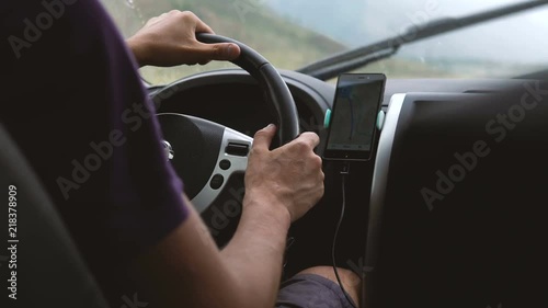Wallpaper Mural A view of the steering wheel and the hands of the driver of the car. Torontodigital.ca