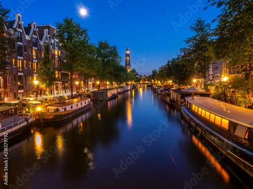 Beautiful Prinsengracht canal in Amsterdam at night. 