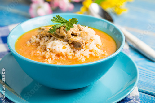 Tomato soup with rice.