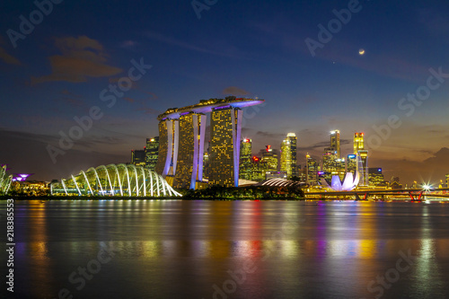 SINGAPORE CITY, SINGAPORE: Aug 15,2018: Singapore Skyline. Singapore`s business district, marina bay sand and the garden by the bay on sunset.
