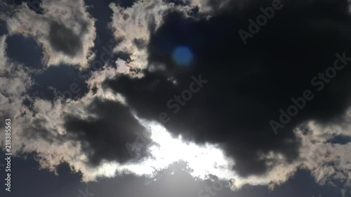 Clouds floats in front of the sun