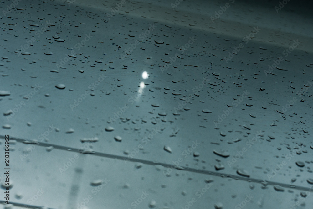 Drops on the glass on the train. On a long trip heavy rain
