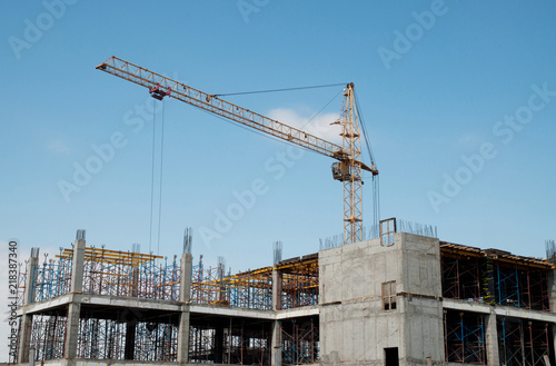 Crane and building construction site.