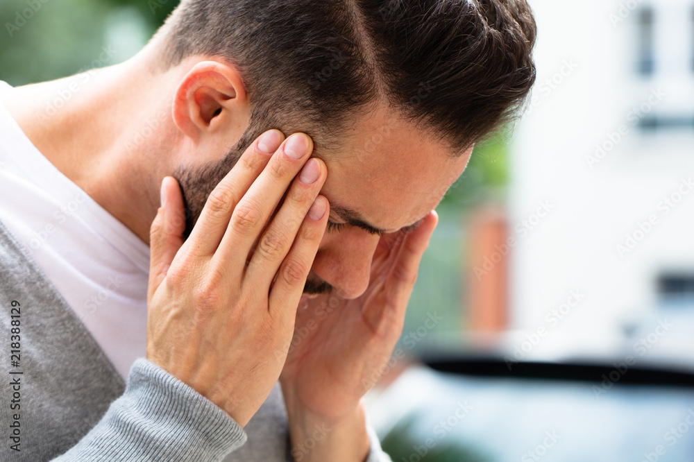 Man Suffering From Headache Man Suffering From Headache