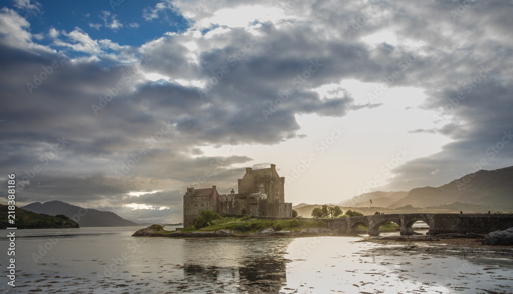 Eilean Donan Castle with cloudy sunset sky  Highlands Scotland Landscape