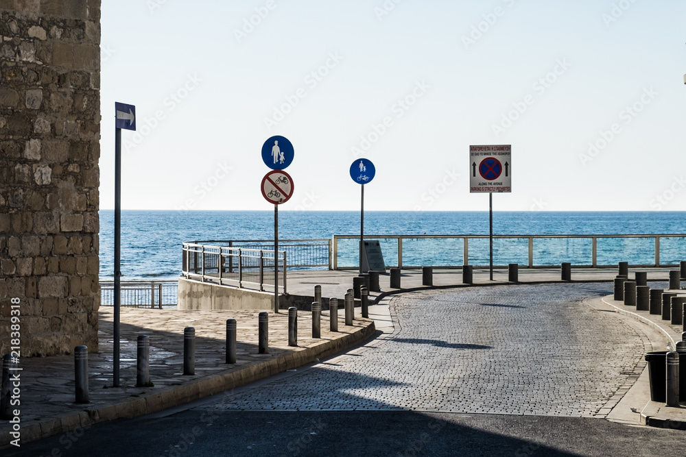 Street signs shows the way to the sea