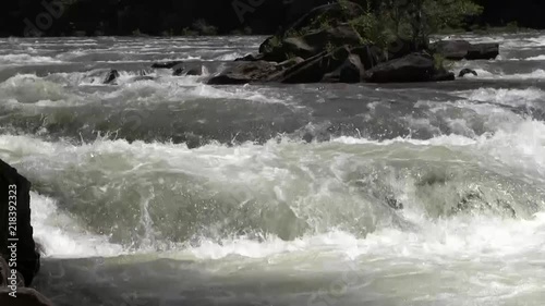 Push to a tight shot of rushing water