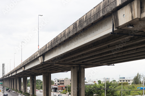 Highway concrete bridge with white cloudy sky