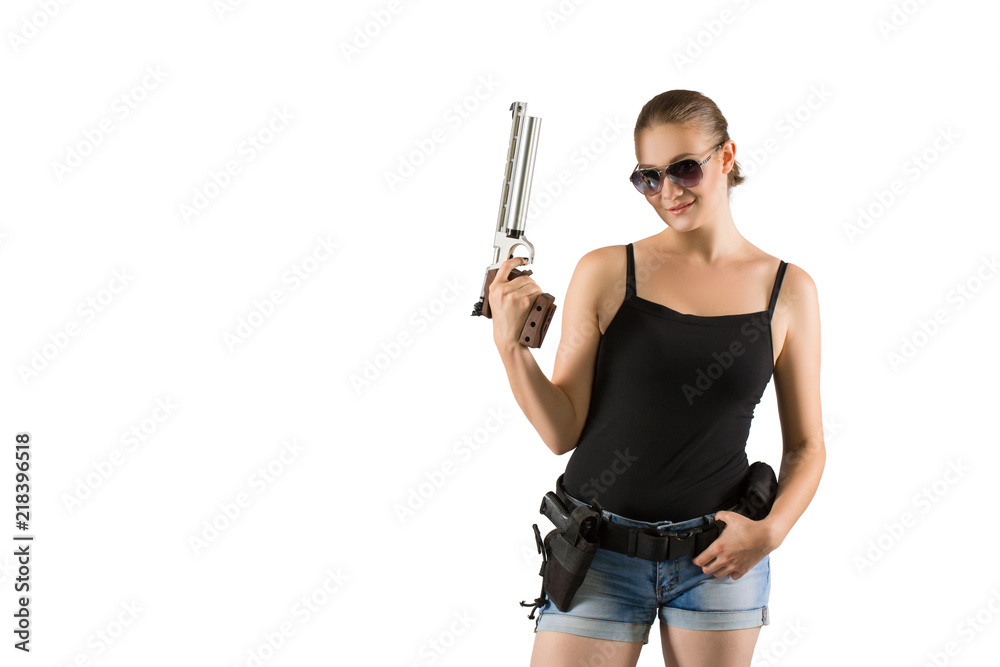 Shot of a sexy military woman posing with gun. Isolated over white.