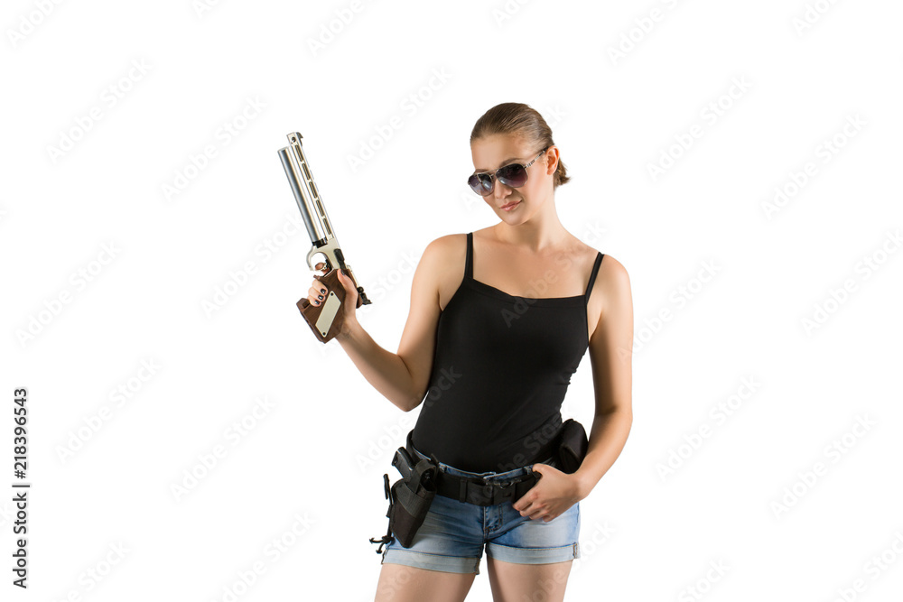 Shot of a sexy military woman posing with gun. Isolated over white.