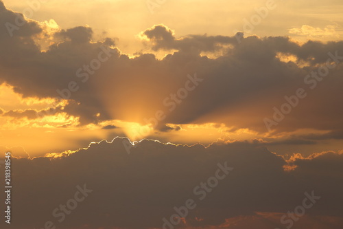 Beautiful sunset with clouds of orange and yellow in the ocean  the river