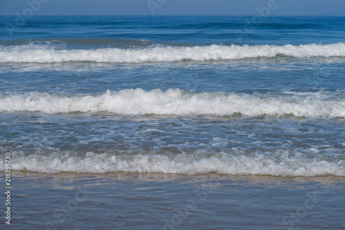 Vacation scene of at the sea on the beach of La Barrosa in Sancti Petri, Spain