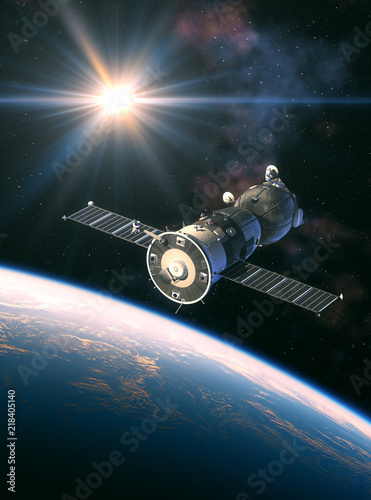 Fototapeta Naklejka Na Ścianę i Meble -  Russian Spacecraft In The Rays Of Light