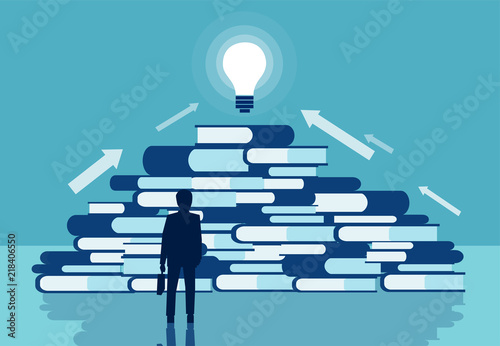 Vector of a businessman standing in front of a pile of books