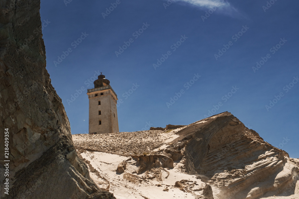 Famous lighthouse on the top of the sand dune cliffs in Northern Denmark. Rubjerg Knude Lighthouse, Lønstrup in North Jutland in Denmark, Skagerrak, North Sea