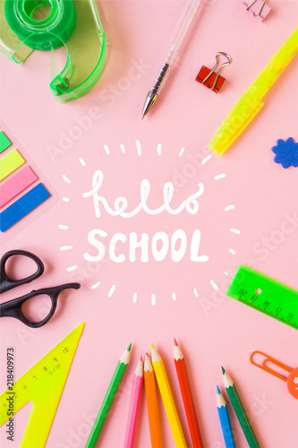 Obraz na plátne Lettering Hello, school with school stationery. Close up.