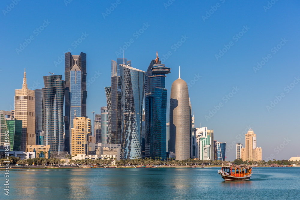 Fototapeta premium DOHA, QATAR - JAN 8th 2018: The West Bay City skyline as viewed from The Grand Mosque on Jan 8th, 2018 in Doha, Qatar. The West Bay is considered as one of the most prominent districts of Doha