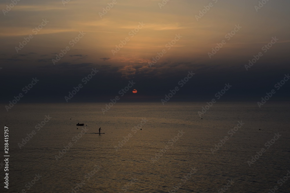Fototapeta premium paddle au coucher de soleil
