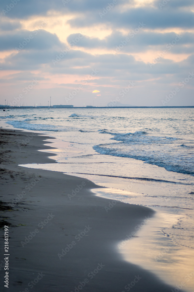 Saaidia sunset beach and waves and rocks
